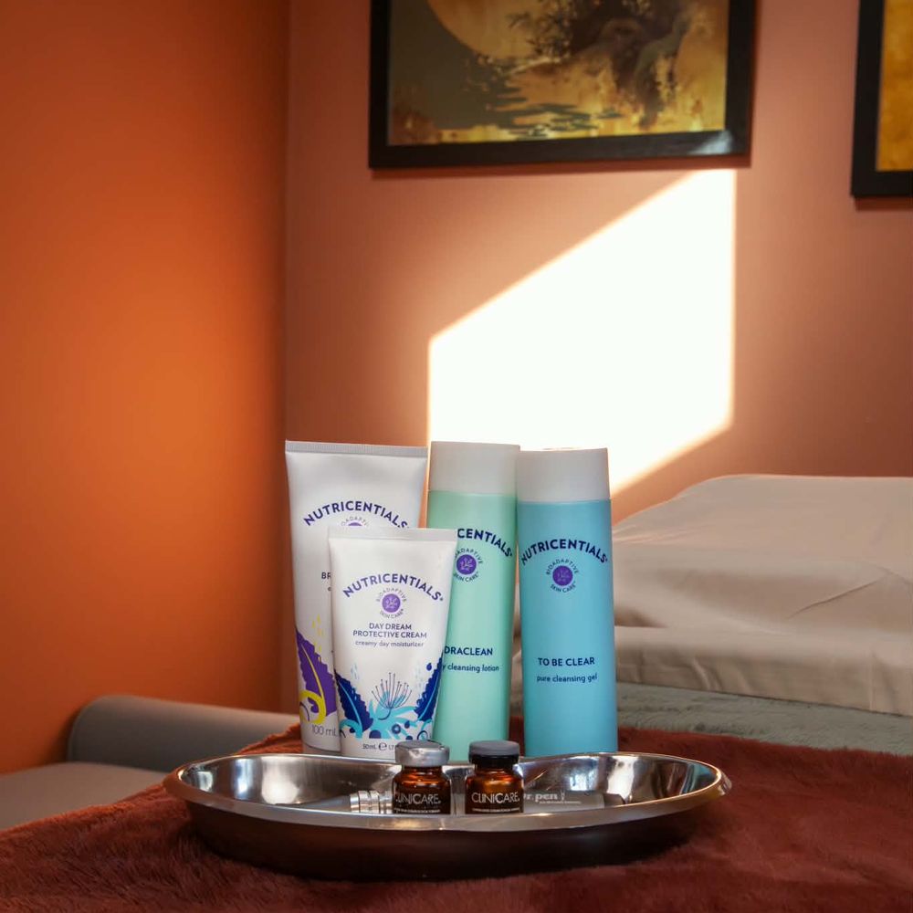 The calm treatment room, prepared with professional skincare